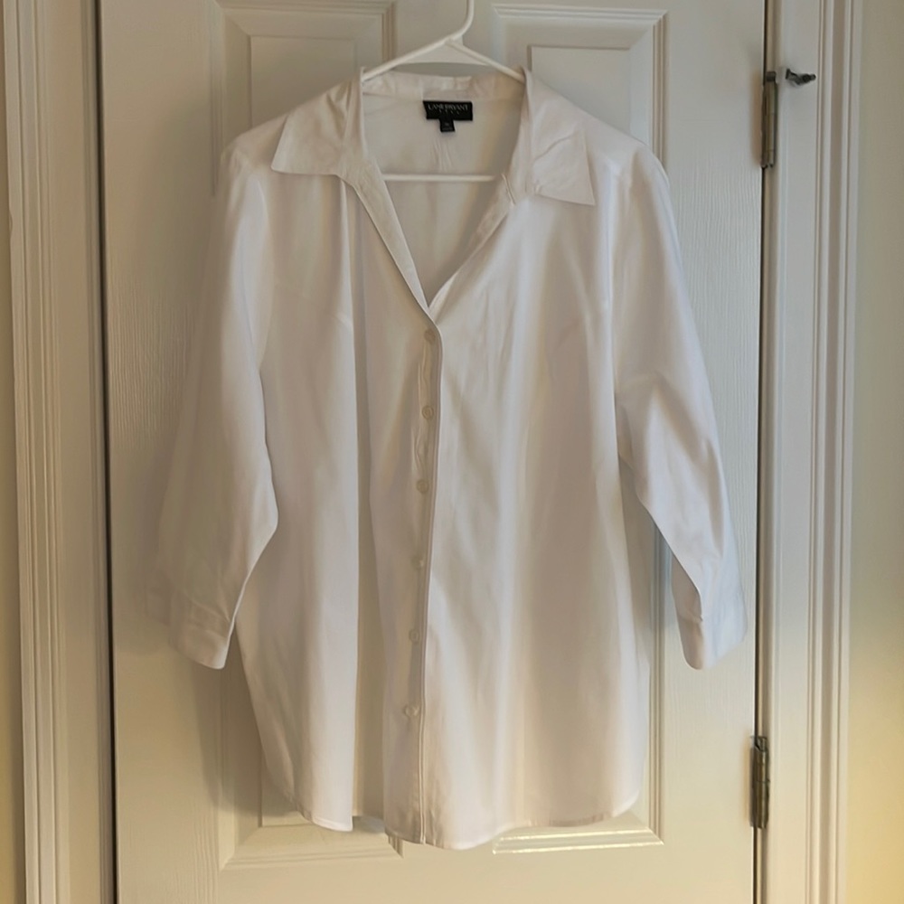 Women’s white 3 quarter button sleeve ladies blouse.
